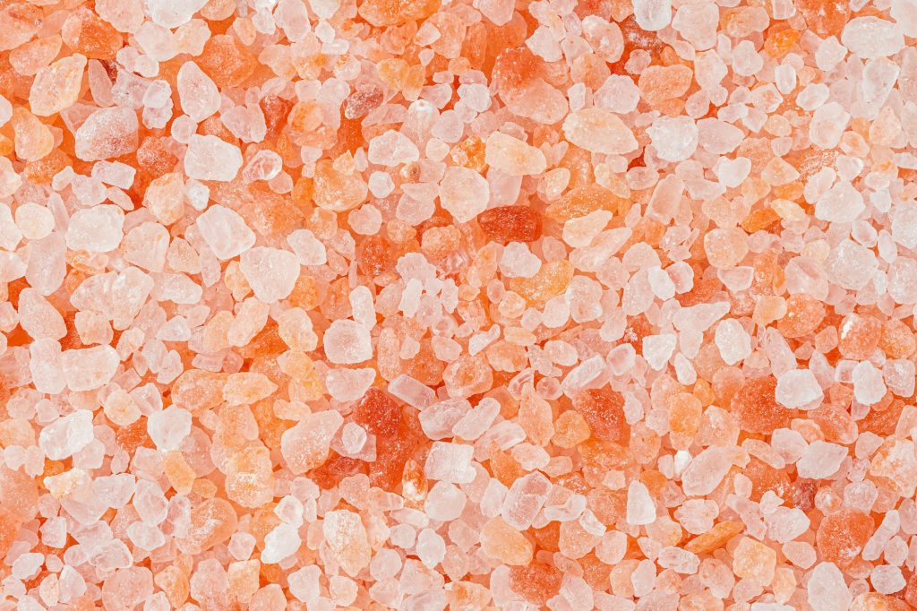 Himalayan pink salt texture. Natural minerals background.